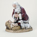 Snow Valley Kneeling Santa with Lamb Figurine