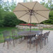 Mississippi Oval 11 Piece Dining Set with Umbrella