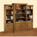 Heirloom Oak 3-Piece Wall Unit & Media Center with Doors & 3 Overhead Brass Spotlights