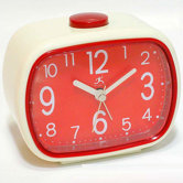 That 70's Retro Alarm Clock in Cream with Red Face
