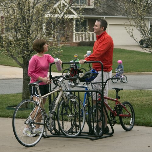 Unique bike stand fits inside the hollow portion of the crank set and